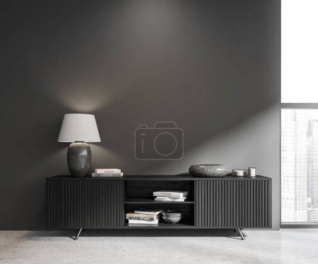 Foto de Interior de la elegante sala de estar con paredes grises, suelo de hormigón, cómoda de madera oscura con lámpara de pie en él y se burlan de la pared. renderizado 3d - Imagen libre de derechos