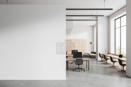 White office interior with table in row, pc computer and laptop. Coworking zone with panoramic window on tropics, grey concrete floor. Mock up empty white partition. 3D rendering