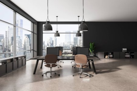 Photo for Dark office interior with pc computer in row on a shared table, armchairs on beige concrete floor. Business room with sideboard and panoramic window on skyscrapers. 3D rendering - Royalty Free Image