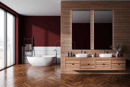 Téléchargez les photos : Intérieur de la salle de bain élégante avec des murs rouges et en bois, plancher en bois, double lavabo confortable et baignoire blanche confortable en arrière-plan. Rendu 3d - en image libre de droit