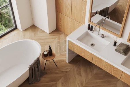 Photo for Top view of wooden bathroom interior with bathtub and sink with mirror, hardwood floor. Bathing corner in home apartment. Panoramic window on tropics. 3D rendering - Royalty Free Image
