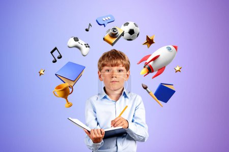 Photo for School boy taking notes and looking at the camera, different multimedia icons. Learning online, future opportunities and art hobbies. Concept of entertainment and education - Royalty Free Image