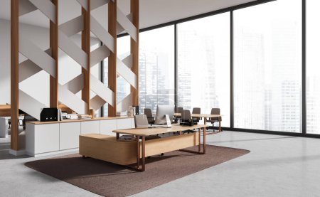 Foto de Interior de la moderna oficina CEO con paredes blancas y estampadas, piso de hormigón, mesa de madera y mesa de conferencias cerca de la ventana. renderizado 3d - Imagen libre de derechos