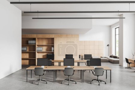 Photo for White coworking interior desk with pc computer, wooden shelves with folders on grey concrete floor. Relax place with sofa near panoramic window on tropics. 3D rendering - Royalty Free Image