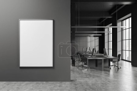 Photo for Dark coworking interior with armchairs, desk with pc computer on grey concrete floor. Panoramic window on skyscrapers. Mock up canvas poster. 3D rendering - Royalty Free Image