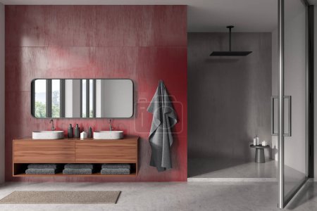 Photo for Front view on bright bathroom interior with shower, mirror, panoramic window with countryside view in reflection, sinks, white, red walls, concrete floor, glass door, shelves with towels. 3d rendering - Royalty Free Image