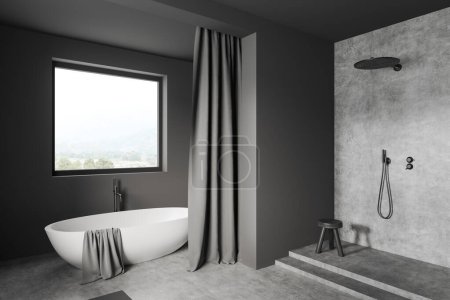 Téléchargez les photos : Intérieur salle de bain sombre avec baignoire et douche, vue latérale. Rideaux et tabouret sur podium en béton gris. Fenêtre panoramique sur campagne. rendu 3D - en image libre de droit