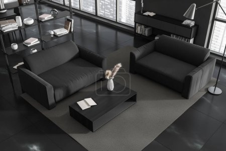 Photo for Top view of dark living room interior with soft armchair, coffee table on carpet, black tile floor. Shelf with art decoration, panoramic window on city view. 3D rendering - Royalty Free Image