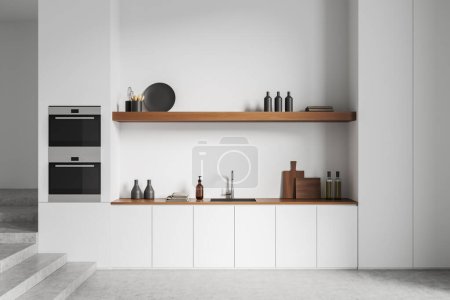 Photo for White kitchen interior with dresser, sink and stylish kitchenware with art decoration. Cooking space in hotel apartment with stairs, light concrete floor. 3D rendering - Royalty Free Image