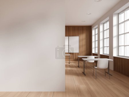 Téléchargez les photos : Intérieur de la salle de classe moderne de l'école avec des murs blancs et en bois, plancher en bois, rangée de bureaux blancs avec des chaises, tableau blanc et mur maquette sur la gauche. Rendu 3d - en image libre de droit