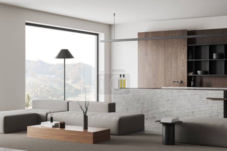 Foto de Esquina de la moderna sala de estar con paredes blancas, cómodo sofá gris, mesa de centro y cocina con armario negro y la isla en el fondo. renderizado 3d - Imagen libre de derechos