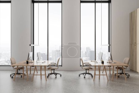 Photo for Interior of minimalistic open space office with white walls, concrete floor and computer tables with chairs. 3d rendering - Royalty Free Image