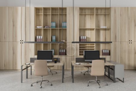 Photo for Light wooden business interior with work table in row, pc computer and shelf with documents on grey concrete floor. Modern coworking zone with minimalist modern furniture. 3D rendering - Royalty Free Image