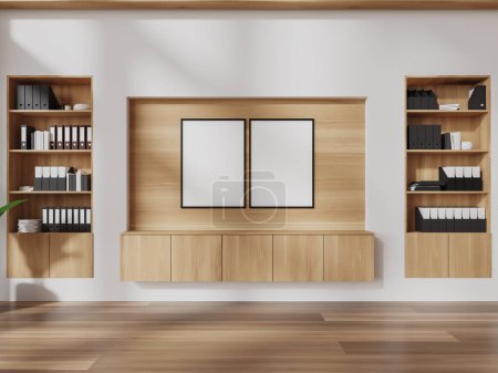 Téléchargez les photos : Intérieur du bureau moderne avec des murs blancs et en bois, plancher en bois, armoire avec deux affiches verticales maquette au-dessus et des bibliothèques. Rendu 3d - en image libre de droit