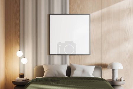 Foto de Dormitorio de madera cama interior y ropa de cama verde, mesita de noche con decoración minimalista y libros. Mock up cartel de lona cuadrada. Renderizado 3D - Imagen libre de derechos