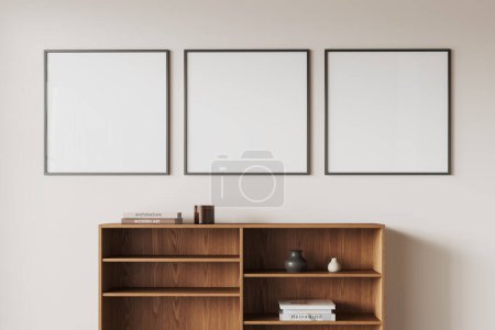 Photo for White living room interior with wooden sideboard and art decoration with books. Modern scandinavian design and three mock up canvas square posters in row. 3D rendering - Royalty Free Image