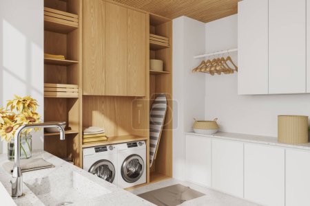 Foto de Apartamento de diseño moderno blanco interior con lavadero con lavabo, lavadora y tabla de planchar con toalla en estante, suelo de hormigón. Renderizado 3D - Imagen libre de derechos