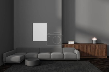 Photo for Interior of modern living room with gray walls, dark wooden floor, comfortable gray sofa, vertical mock up poster hanging above it and dark wooden dresser. 3d rendering - Royalty Free Image