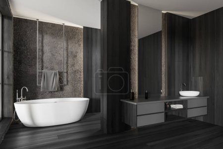 Photo for Black hotel wooden bathroom interior with sink and mirror, side view, bathtub with towel on a rail, dark hardwood floor. 3D rendering - Royalty Free Image