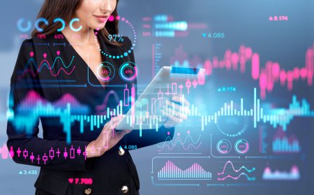 Photo for Smiling businesswoman working with tablet. Virtual screen with stock market analysis, double exposure, forex hud with numbers and lines. Concept of online consulting - Royalty Free Image
