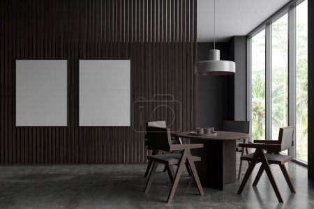 Photo for Dark living room interior with chairs and dining table. Meeting area with panoramic window on tropics, grey concrete floor. Two mock up posters, 3D rendering - Royalty Free Image