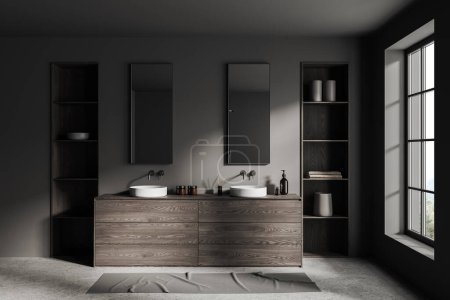 Photo for Interior of stylish bathroom with gray walls, concrete floor, comfortable double sink standing on dark wooden cabinet, two vertical mirrors, shelves for towels and big window. 3d rendering - Royalty Free Image