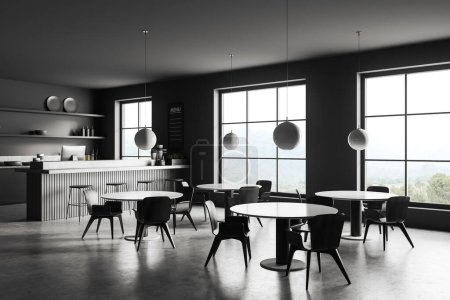 Téléchargez les photos : Vue en angle sur l'intérieur moderne du café sombre avec fenêtre panoramique, tables avec fauteuils, mur gris, sol en béton, comptoir de bar avec tabourets de bar et ordinateur. Concept de design minimaliste. Rendu 3d - en image libre de droit