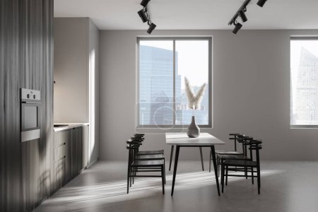 Foto de Elegante cocina interior con sillas y mesa de comedor en suelo de hormigón gris. Zona de cocción con diseño minimalista. Ventana panorámica de los rascacielos de Singapur. Renderizado 3D - Imagen libre de derechos