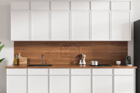 Téléchargez les photos : Intérieur de cuisine blanche avec évier, cuisinière et ustensiles de cuisine minimalistes. Coin cuisine dans le studio de l'hôtel, rendu 3D - en image libre de droit