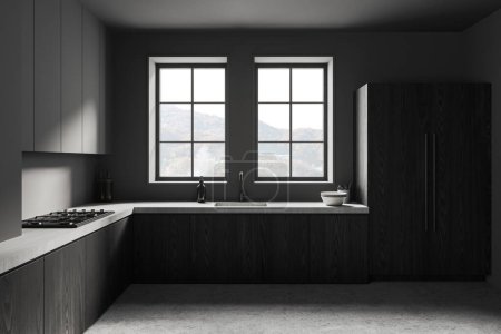 Foto de Interior de cocina moderna con paredes grises, suelo de hormigón, armarios grises y armarios de madera oscura con cocina empotrada y fregadero con dos ventanas encima. renderizado 3d - Imagen libre de derechos