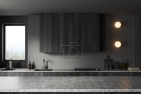 Photo for Grey quartz stone island on background of blurred black wooden kitchen interior, kitchenware and panoramic window. Mockup copy space for product display. 3D rendering - Royalty Free Image