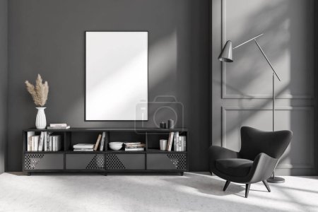 Photo for Dark living room interior with armchair and lamp on grey concrete floor. Sideboard with modern art decoration. Mock up blank poster. 3D rendering - Royalty Free Image