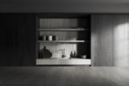Foto de Mesa de piedra para su producto en cocina borrosa con paredes de madera gris y oscura, armarios con fregadero incorporado y estantes para platos. 3d renderizado, espacio de copia - Imagen libre de derechos