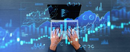 Photo for Man hands typing on laptop keyboard, top view. Forex hologram dashboard with diagrams and bar chart with candlesticks. Concept of online trading and big data analysis - Royalty Free Image