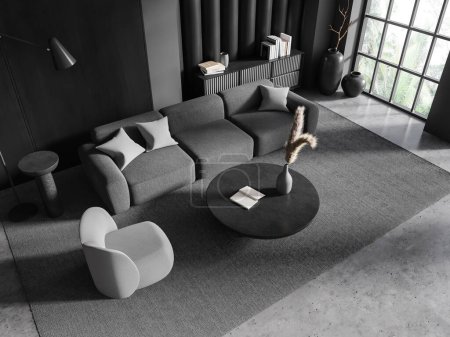 Photo for Top view of stylish living room with gray and wooden walls, concrete floor, comfortable gray couch and armchair standing near round coffee table and gray dresser. 3d rendering - Royalty Free Image