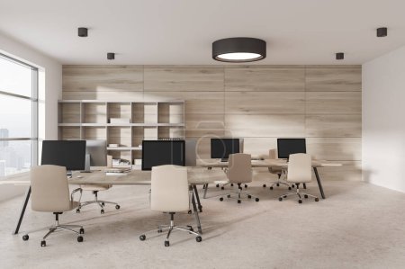 Foto de Espacio abierto interior de coworking blanco con sillones y ordenador PC en fila, escritorio y estante minimalista en suelo de hormigón beige. Ventana panorámica sobre rascacielos. Renderizado 3D - Imagen libre de derechos