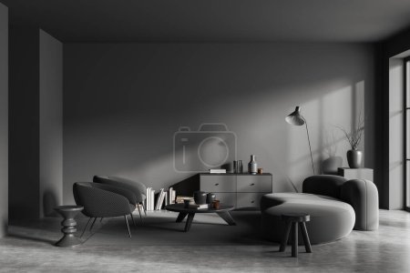 Foto de Interior oscuro de la sala de estar con sofá y sillones, mesa de centro con libros y decoración, alfombra en piso de hormigón gris. Mockup copia espacio gris pared, renderizado 3D - Imagen libre de derechos