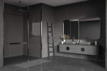 Téléchargez les photos : Intérieur de salle de bain sombre avec double lavabo et douche derrière des portes vitrées, vue latérale. Coin de bain moderne avec échelle porte-serviettes et accessoires minimalistes, sol en béton gris. rendu 3D - en image libre de droit