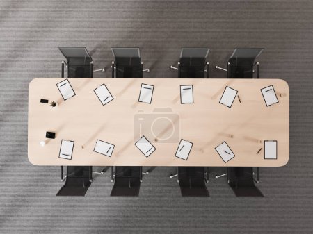 Téléchargez les photos : Vue de dessus de l'intérieur de la salle de conférence avec fauteuils noirs, clipboard sur table de réunion en bois, sol en béton gris. Zone de négociation minimaliste avec des meubles modernes. rendu 3D - en image libre de droit
