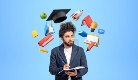 Photo for Pensive young Middle Eastern man college student standing with notebook and pen over blue background with education icons around him. Concept of business education and startup - Royalty Free Image