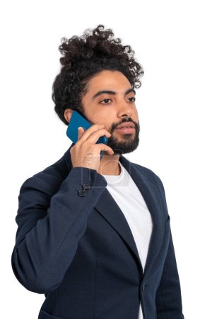 Photo for Middle eastern businessman portrait calling on the phone, isolated over white background. Concept of network and communication - Royalty Free Image