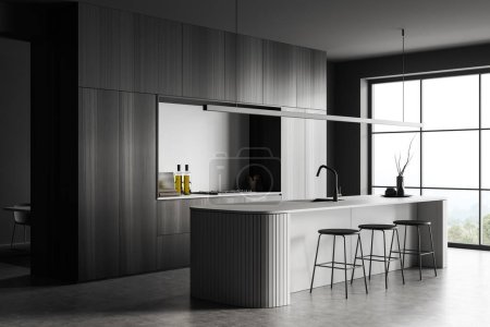 Photo for Dark kitchen interior with bar stool and countertop, side view on grey concrete floor. Kitchenware and decoration, cooking space with panoramic window on countryside. 3D rendering - Royalty Free Image