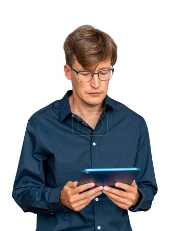 Photo for Concentrated businessman working in tablet, portrait in blue shirt. Business network and social media, isolated over white background. Concept of online communication and shopping - Royalty Free Image