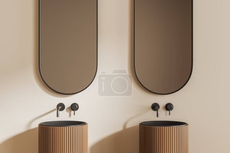 Foto de Moderno cuarto de baño interior con doble lavabo y dos espejos ovalados. Zona de baño ligera con pared beige. Renderizado 3D - Imagen libre de derechos