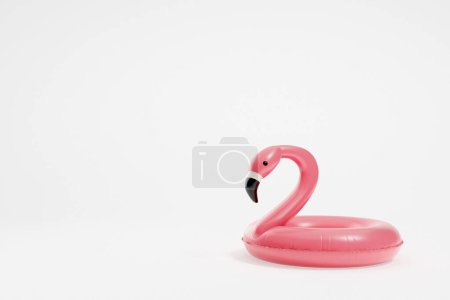 Foto de Anillo de goma de flamenco inflable, accesorio de verano de piscina sobre fondo blanco vacío. Concepto de fines de semana. Copiar espacio. Renderizado 3D - Imagen libre de derechos