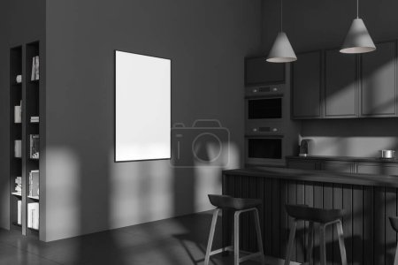 Téléchargez les photos : Vue d'angle sur l'intérieur de la cuisine sombre avec affiche blanche vide, placard, mur gris, four, machine à café, étagères, livres, cuisinière à gaz, île, tabourets de bar. Concept de design minimaliste. Rendu 3d - en image libre de droit