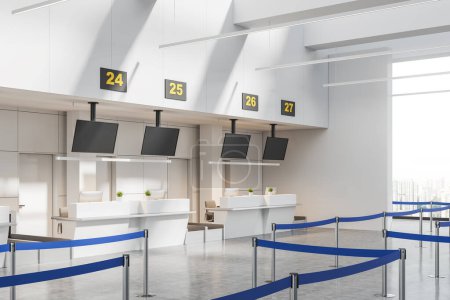 Téléchargez les photos : Coin de l'aéroport moderne avec des murs blancs, vérifiez dans la zone de réception avec rangée de tables pour l'enregistrement et les écrans de télévision avec des numéros de porte. Rendu 3d - en image libre de droit