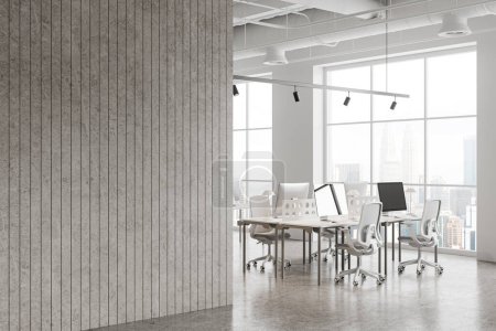 Photo for Interior of modern open space office with white walls, concrete floor, row of white computer tables with chairs, big window with cityscape and blank stone wall. 3d rendering - Royalty Free Image
