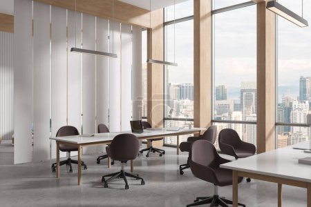 Photo for White office interior with chairs and desk in row, side view laptop with books. Stylish coworking library corner with minimalist furniture. Panoramic window on Kuala Lumpur skyscrapers. 3D rendering - Royalty Free Image