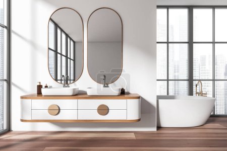 Foto de Interior del baño blanco con bañera y doble lavabo con espejo. Elegante zona de baño con ventana panorámica de los rascacielos de Singapur. Renderizado 3D - Imagen libre de derechos